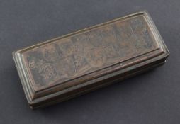 An 18th century Dutch rectangular copper tobacco box, engraved with various coats of arms and