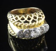 A mid 20th century triple band gold and five stone diamond set dress ring, with stepped diamond