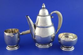 A Georg Jensen sterling silver three piece coffee set, design no. 34A, of tapering circular form,