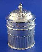 An Edwardian silver biscuit box by William Hutton & Sons Ltd, of cylindrical form, with hinged