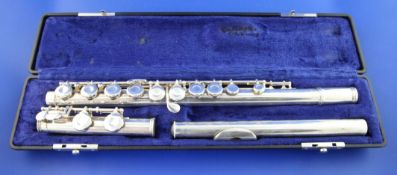 A cased American Gemeinhardt silver three section flute, signed and numbered 2ES 413378, 26.25in.