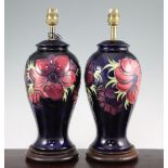 A pair of Moorcroft Anemone pattern lamp bases, late 20th century, each of baluster form with cobalt