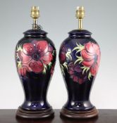 A pair of Moorcroft Anemone pattern lamp bases, late 20th century, each of baluster form with cobalt