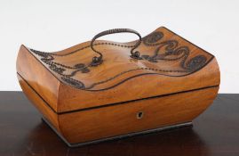 A 19th century French cut steel, pique and satinwood sarcophagus shaped necessaire, the hinged lid