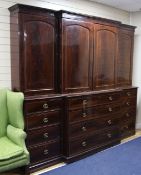 A 19th century mahogany and boxwood line inlaid breakfront bookcase, fitted four panelled doors