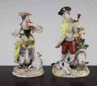 A pair of Meissen groups of a musical shepherd and shepherdess, 20th century, the shepherd playing