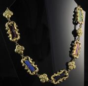 A Victorian style gilt metal and coloured paste necklace, with foliate links and set with multi-