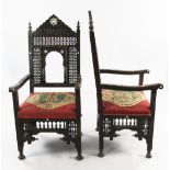 A late 19th century moorish open armchair, with Mashrabiya panels and mother of pearl inlaid