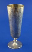 A Victorian silver pedestal goblet, of tapering cylindrical form, with engraved foliate scroll