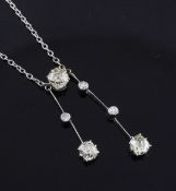 A 1920's platinum and diamond drop pendant necklace, with two graduated bar link drops set with