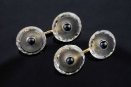 A pair of 14ct gold, rock crystal and cabochon sapphire set disc cufflinks.