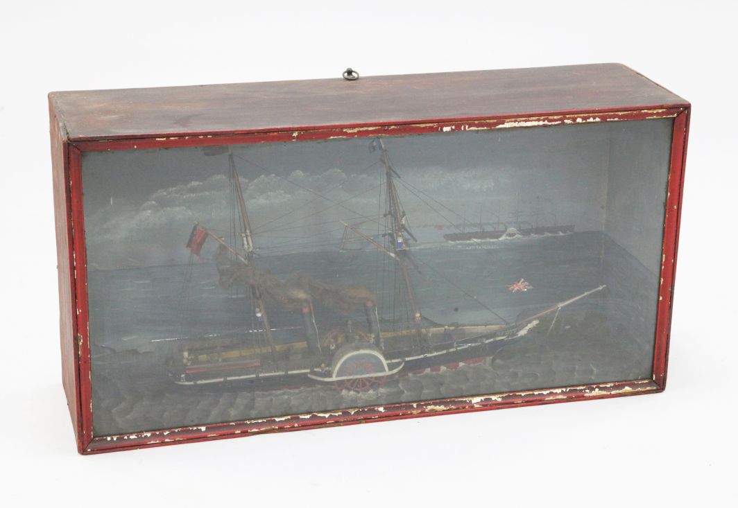 A Victorian cased diorama of a paddle steamer, with twin funnels, overall 24.5in.