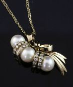 A 14ct gold, cultured pearl and diamond set pendant, of ribbon bow design, on a 9ct gold fine link