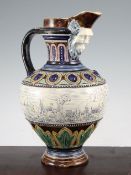 An Amphora pottery ewer, late 19th century, the ovoid body scratch blue decorated in Hannah Barlow