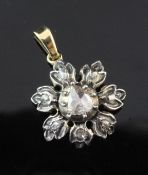 A 19th century gold, silver and diamond set flower head pendant, set with old mine and rose cut