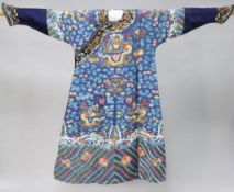 A Chinese blue satin embroidered silk and metal thread dragon robe, Jifu, late 19th / early 20th