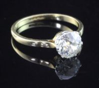 A 18ct and platinum solitaire diamond ring, the round cut stone approximately estimated at 1.30ct,