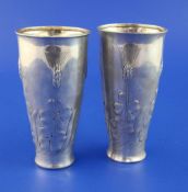 A stylish pair of early 20th century continental silver spill vases, of tapering cylindrical form,