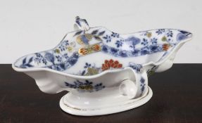 A Meissen double-lipped sauceboat, dot period, c.1780, 21.8cm A Meissen double-lipped sauceboat, dot