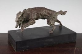 A patinated bronze study of a running dog, 12in. A patinated bronze study of a running dog,