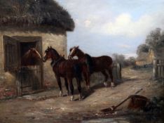 Thomas Smythe (1825-1907) Loading a haycart and horses beside a stable, 13 x 17in. Thomas Smythe (