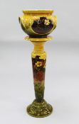 A Bretby Aesthetic period pottery jardiniere and stand, late 19th century, jardiniere 27cm across,