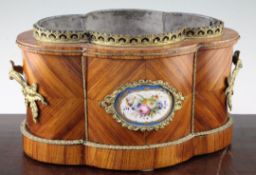 A 19th century French serpentine shape kingwood two handled jardiniere, 14.5in. A 19th century