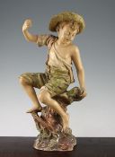 A late 19th century Goldscheider cold painted terracotta figure of fisherboy, modelled by