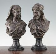 A pair of 20th century bronzed metal busts of male and female Arabs, 13in. A pair of 20th century