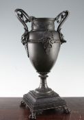 A 19th century bronze classical style two handled urn, 18.5in. A 19th century bronze classical style