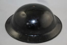 A WWII mark II Brodie helmet & another similar A WWII mark II Brodie helmet, liner marked Vero II