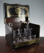 A 19th century French ebony, tortoiseshell and brass inlaid liqueur set, 13in. A 19th century French