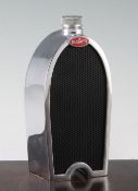 A Ruddspeed chrome plated spirit flask, modelled as a Bugatti radiator grille, 8in. A Ruddspeed