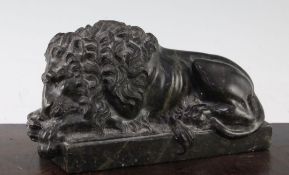 After Canova. A green serpentine marble statue of a recumbent lion 8.5in. After Canova. A green