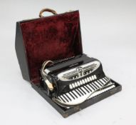 A cased Giulietti Classic 127 accordion, 21.5in. A cased Giulietti Classic 127 accordion, 21.5in.