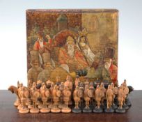 An unusual 19th century Russian figural carved wood chess set, An unusual 19th century Russian