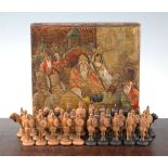 An unusual 19th century Russian figural carved wood chess set, An unusual 19th century Russian