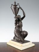 A Victorian patinated bronze figure of an eastern water carrier 18.5in. A Victorian patinated bronze
