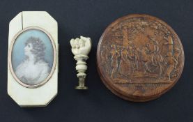 A snuff box, a box and a desk seal A 19th century French burr wood circular snuff box, the top