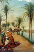 Enrico Tarenghi (Italian, 1848-1938) Arabs and camels beside the Nile, 31.5 x 22in., unframed Enrico