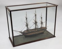 A model of an 18th century frigate, overall 40.5in. A model of an 18th century frigate, within a