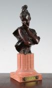 After Georges van der Straeten, Malicieuse. A patinated bronze bust of a young lady, After Georges