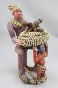 A large Cameroon Bamileke Bamum beadwork figure, H.4ft. A large Cameroon Bamileke Bamum beadwork