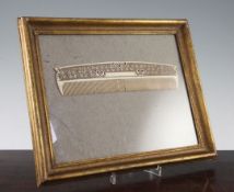 A large 19th century carved and pierced ivory comb A large 19th century carved and pierced ivory