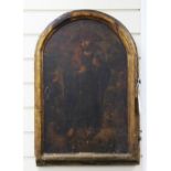 An 18th / 19th century continental arched panelled door, 25 x 16.5in. An 18th / 19th century