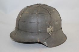 A German Third Reich M42 army helmet, A German Third Reich M42 army helmet, with single decal and