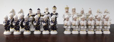 A 20th century Royal Dux porcelain figural chess set, A 20th century Royal Dux porcelain figural