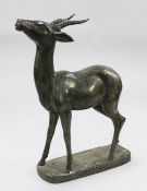 A 20th century large green patinated bronze figure of a gazelle, 31 x 36in. A 20th century large