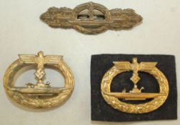 A German Third Reich close combat U boat badge & 2 others A German Third Reich close combat U boat