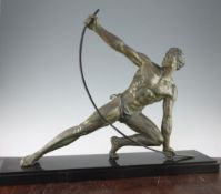 J De Roncourt. A bronzed metal figure of a strong man bending an iron bar, 28.5in. J De Roncourt.